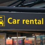 Car rental sign at a airport